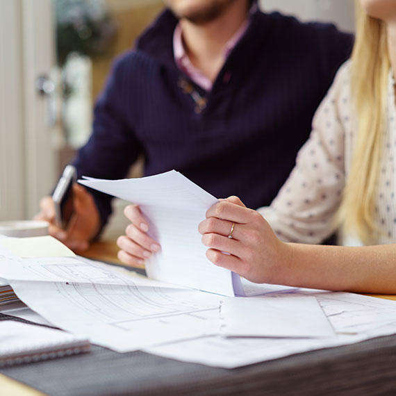 Couple looking at investment strategies